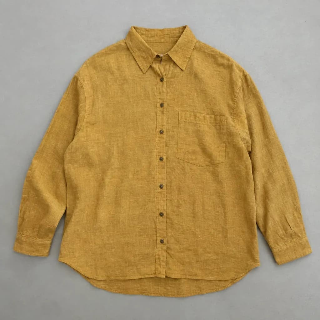 Foto asli kemeja linen mustard di atas meja